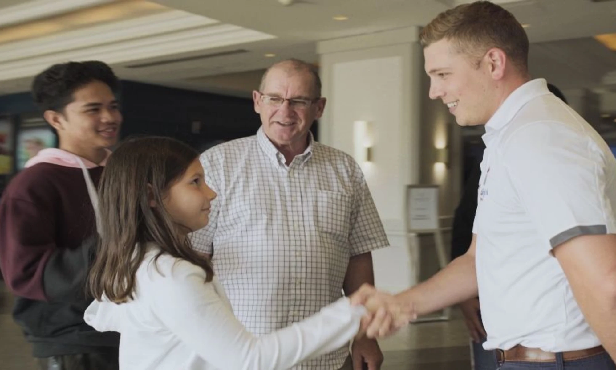 A certified guide greeting cruise guests at the start of a shore excursion
